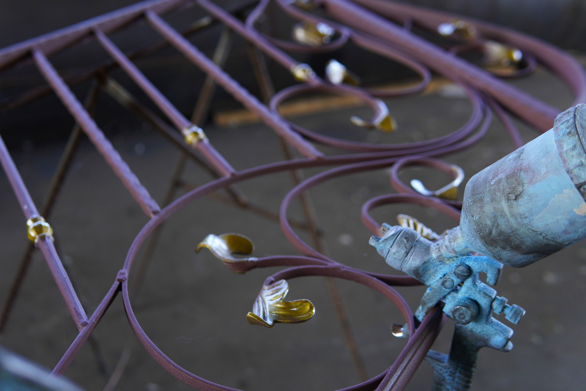 Decorative forged railings. Artistic metalwork with a floral pattern.