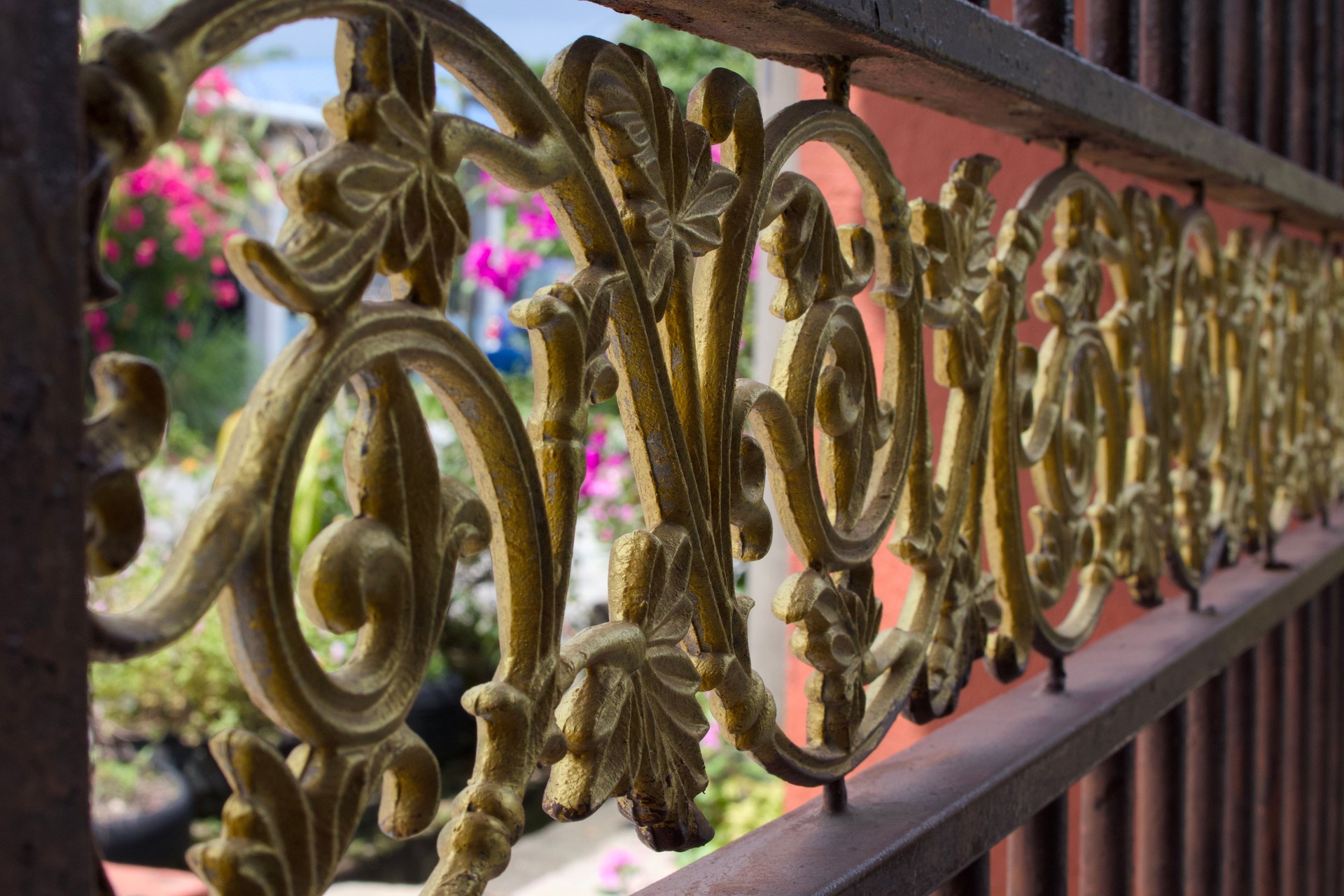 Elegant wrought iron fence close-up.